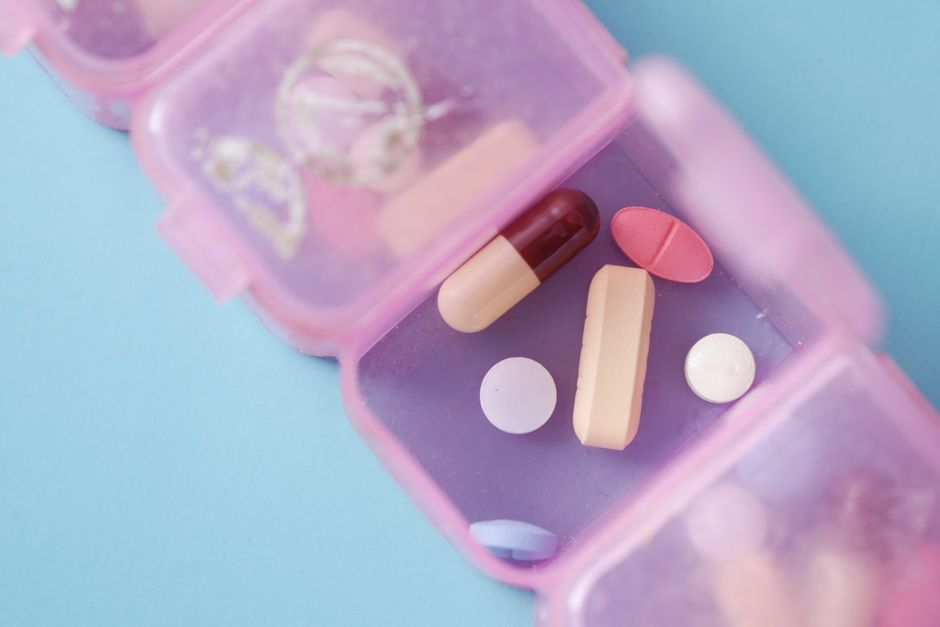 A locked medication safe box used to store oxycodone pills securely at home