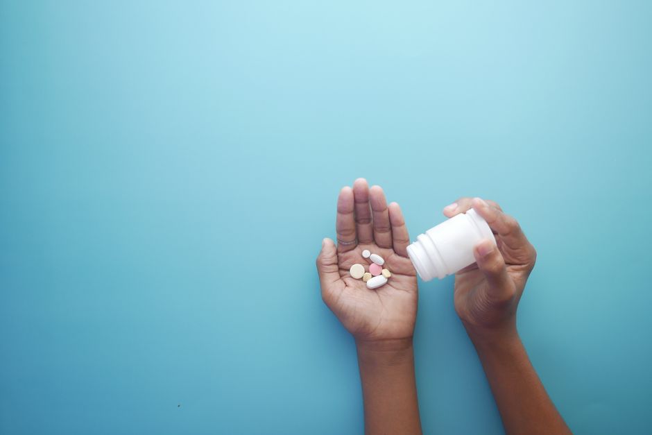 Bottles of prescription opioid pills representing oxycodone and codeine comparison