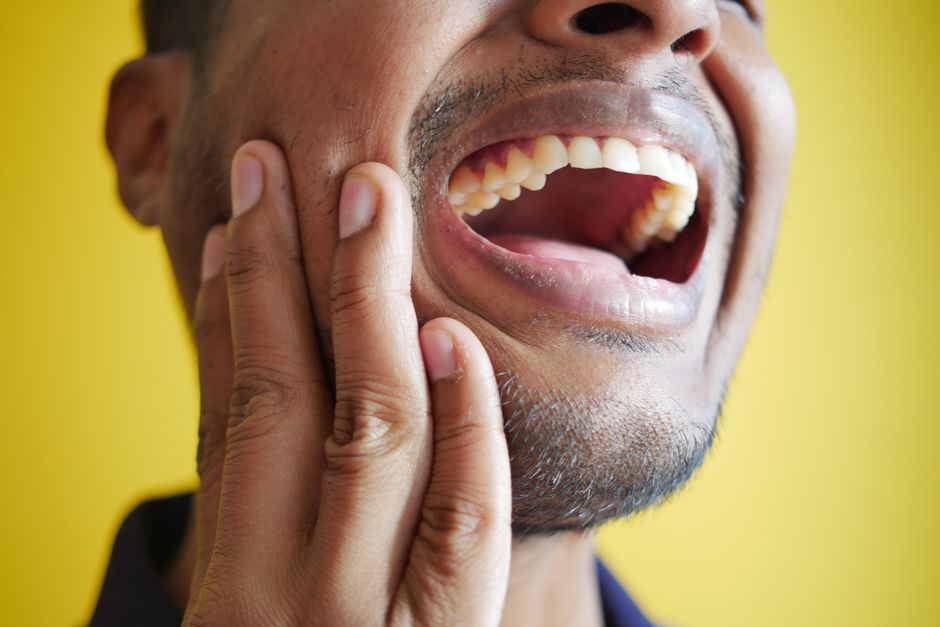 Man experiencing hiccups as a side effect of oxycodone medication