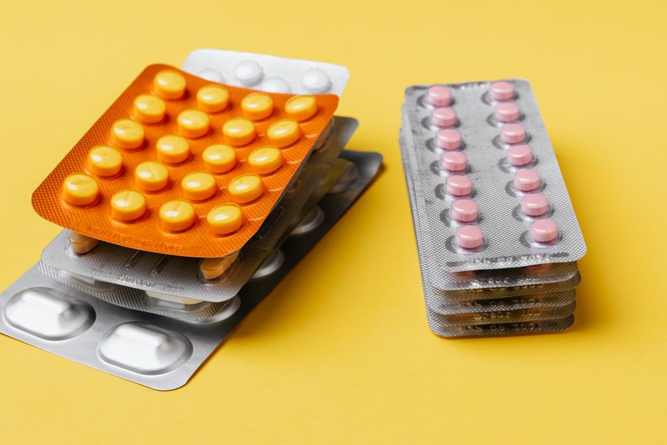 Pharmacist reviewing an oxycodone prescription bottle for a Georgia patient