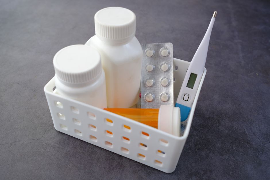 Prescription pill bottles arranged together representing common medications that interact with oxycodone