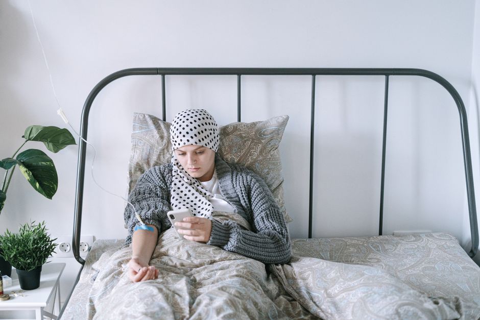 Cancer patient discussing hydrocodone pain medication options with a doctor